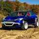 Illustration for article titled The Kia Forte Koup Mud Bogger Concept Is Badass Even If Its Two-Wheel Drive